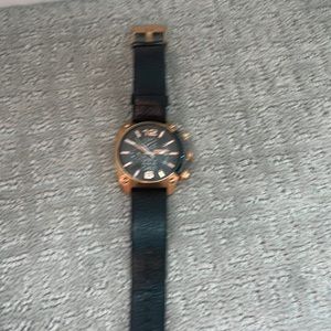 Diesel black leather and rose gold multi function watch. Needs battery